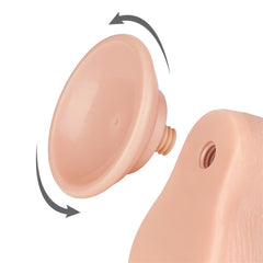 Juguetes sexuales para adultos, consolador deslizándose sobre una superficie blanca