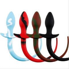 Black anal plug with realistic lizard scale texture and tapered tip