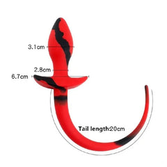Flexible, body-safe silicone anal plug with lizard tail handle for easy removal