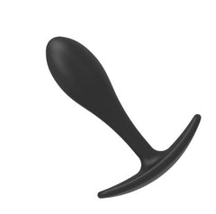 Plug Trío Black with cords plugged in and devices charging