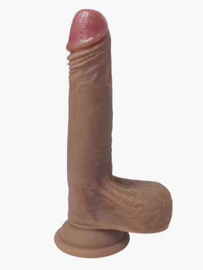 ###
Imagen de un consolador de color dorado con detalles en relieve, inspirado en Aladdin