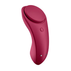 Woman adjusting Satisfyer Sexy Secret vibrator with remote control