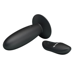 Black plug vibrator with remote control and 12 different functions for intimate pleasure