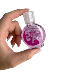 A couple using Lubricante Duo Frío Calor in the bedroom, with the product visible on the bedside table