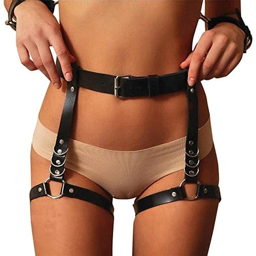 Black lace garter belt and suspenders on a woman's waist
