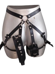 Woman wearing black lace harness garter with attached restraints
