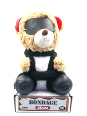 Close-up of Oso Sado teddy bear plush toy with embroidered eyes and smiling face