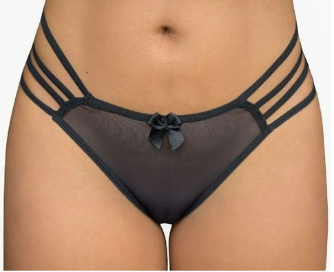 Delicious and creamy Tanga Tiramisú, a perfect blend of coffee, mascarpone, and ladyfinger biscuits, served in a glass dish, with cocoa powder sprinkled on top