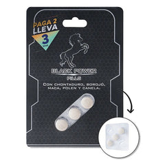 Three black power pills, two purchased and one free, stacked on white background