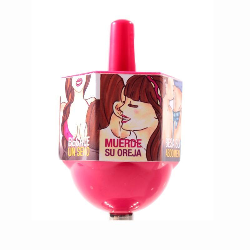 Colorful wooden pirinola game with the word Besos (Kisses) written on it, perfect for fun and interactive family game nights