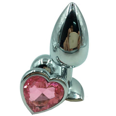 Black silicone heart-shaped anal plug with jeweled base for pleasure