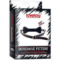 Close-up of red SILICONE DOG BONE GAG for BDSM play