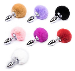 Shiny metal anal plug with fluffy rabbit tail for kinky fun
