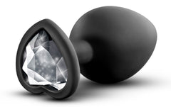 Heart-shaped silicone anal plug with glittering jewel accent for sensual stimulation