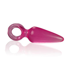 Soft and flexible pink anal toy with smooth surface and wide base