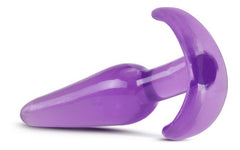 Black silicone butt plug with flared base and tapered tip