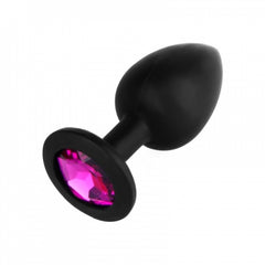 Luxurious red silicone anal plug with round shape and decorative jewel