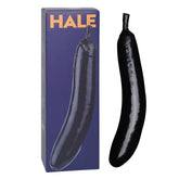 Berenjena Devin Black eggplant with glossy and deep purple skin, fresh from the garden, organic and ripe for harvest