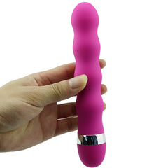 VIBRADOR CURLY: A pink, ribbed vibrator with multiple speed settings