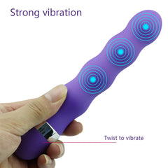 Curly vibrator with textured shaft and flexible design for enhanced pleasure