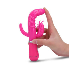 Woman holding the VIBRADOR DRAGON TRIPLE SENSE for sensual pleasure