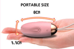 White Huevo Vibrador Little Whale Lilo with charging cable on a white background