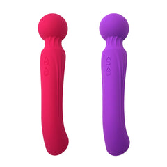 Woman using YULA massager wand on neck and shoulders for deep tissue relief