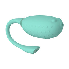 Magic Fugu Red - Green product displayed on a wooden tabletop, adding a pop of color to any space