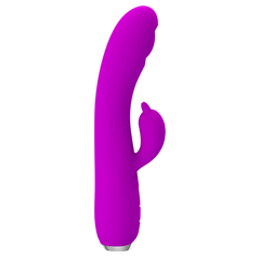 Woman holding the Regina vibrator and suction cup, showcasing its ergonomic design and easy-to-use features