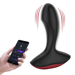 Hand holding the Magic Solstice Plug Anal Vibrador, showing its size and shape