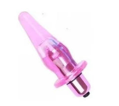 Hand holding plug anal vibrador pool with flexible, body-safe silicone material and discreet size for travel and storage