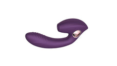 Woman using the Valerie Winyi vibrator for dual G-spot and clitoral stimulation