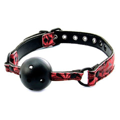 Close-up of Ball Gag Freya with a red silicone ball and silver chain