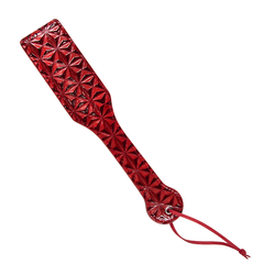 Black leather paddle with silver studs and a luxurious design for fetish play