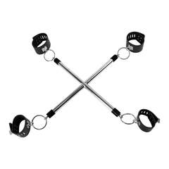 Black metal hogtie restraints for BDSM play, featuring durable construction and secure locking mechanisms