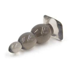 Black silicone anal plug with jeweled base for sensual play