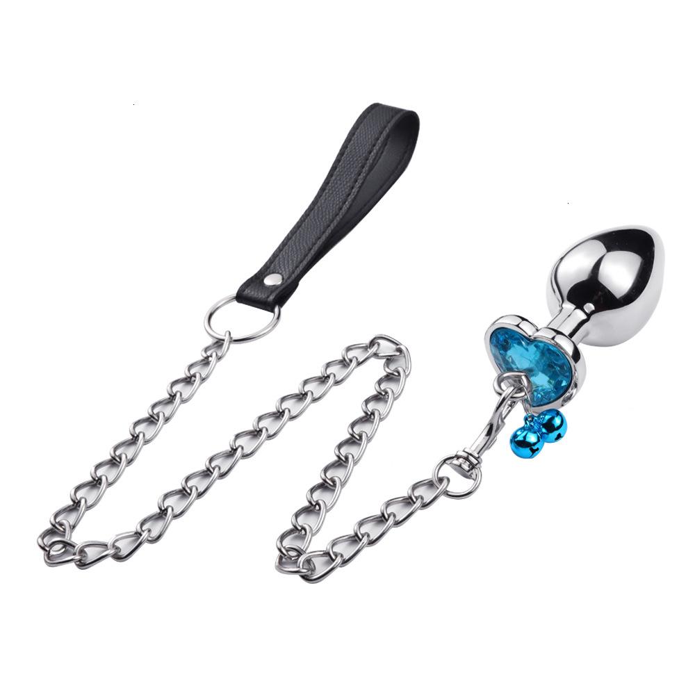 Stainless steel anal plug with chain and gemstone detail for pleasure and stimulation
