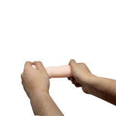 Woman holding ANO PASSION LADY MANDY vibrator, showcasing its ergonomic design, powerful motor, and rechargeable feature for ultimate convenience and pleasure