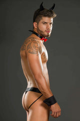 Close-up of fiery Diavoletto Picante hot sauce drizzled over a plate of spicy chicken wings