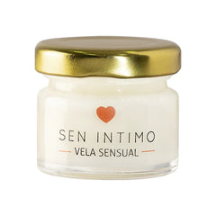 Close-up of Vela Masajes Pheromonas Sen Intimo 25 g candle burning
