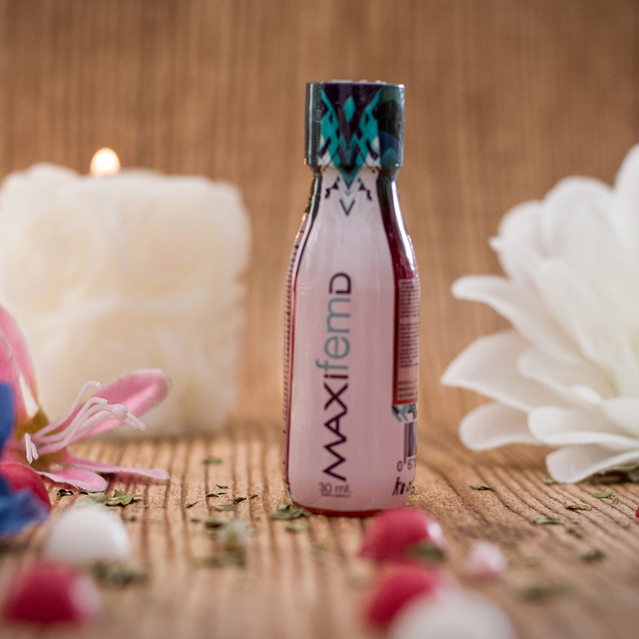 A 30 ml bottle of Maxifemd Feminine Energizer, designed to boost energy and vitality in women