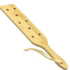 Handcrafted bamboo paleta with smooth finish and intricate carvings