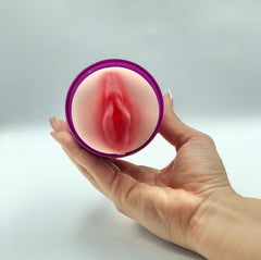 Vagina Ano Karla product image with hands holding and demonstrating size and flexibility
