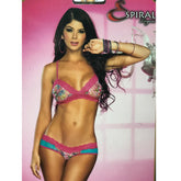 Beautiful set of pink flowers in a vase on a wooden table, perfect for any home decor