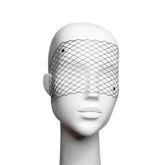 Close-up of eye mask with breathable mesh fabric and hypoallergenic adhesives