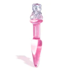 Adorable brown plush teddy bear with a colorful butt plug accessory