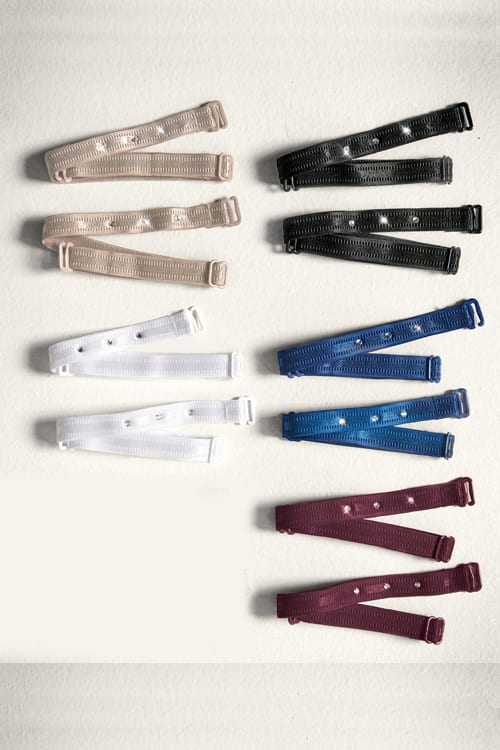 Black lace bra strap with adjustable silver clasp and delicate floral pattern