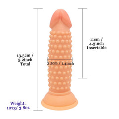 Hand holding Dildo Texturizado Cob to show its size and grip