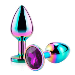  Hand holding Plug Joya Tornasol with sunlight reflecting off its iridescent surface
