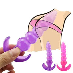 Close-up of smooth, curved anal plug with tapered tip and flared base